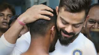 Virat Kohli embraces fan with jersey number, achievements tattooed on his body